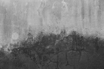 Black paint on the old abstract design surface of the concrete cement gray wall texture grunge background