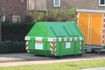 Locked garbage dumpster