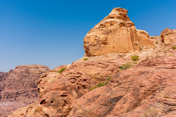 Fototapeta na wymiar Jordan, mountains around the city of Petra, daytime landscape on a sunny bright day
