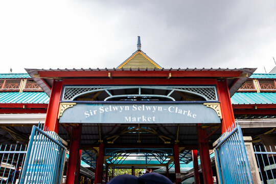 Victoria, Seychelles, 04.05.2021. Sir Selwyn Selwyn-Clarke Market colorful building, with red, blue and turquoise roof and walls, view from the entry gate, Victoria, Seychelles.