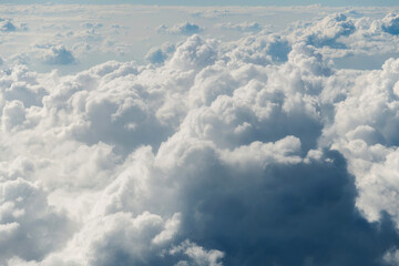 Aerial view on fluffy clouds only