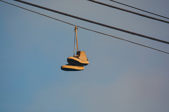 Tennis Shoes Hanging Power Line Stock Photos - Free & Royalty-Free Stock  Photos from Dreamstime