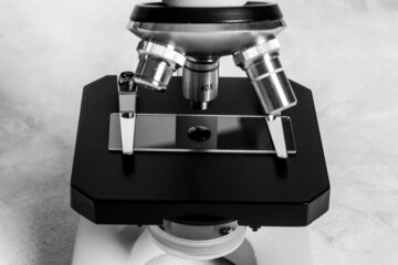 Lens of microscope close up. Research in scientific medical laboratory