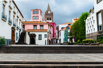 Obraz premium Beautiful view of a square with colorful buildings in Funchal, Madeira