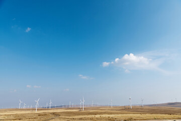 Wind turbines on autumn landsape