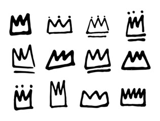 Set of hand-drawn crowns in black. Vector. Doodle. Suitable for illustrations.