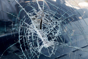 Close up of broken car windshield - obrazy, fototapety, plakaty