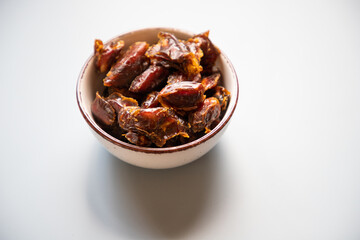 dates in a bowl for eid mubarak