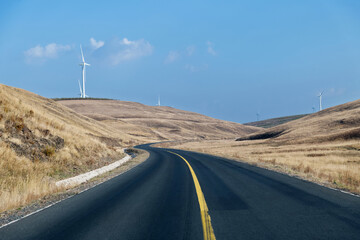 Landscape of highway and windmills