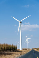 Fototapeta premium Landscape of highway and windmills