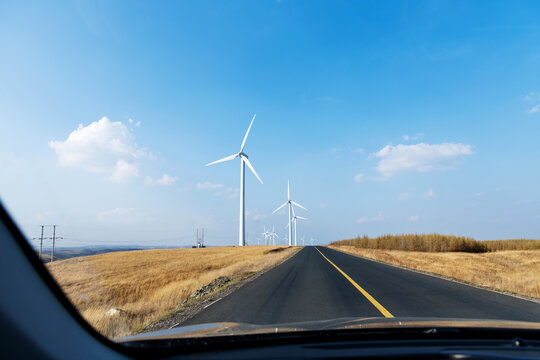 Landscape of highway and windmills