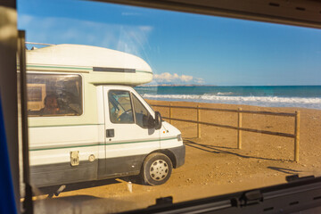 View from caravan inside on camper on beach