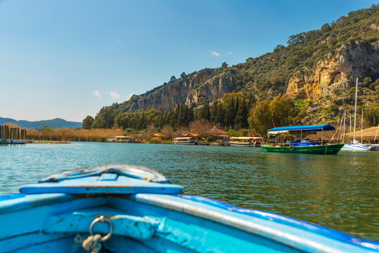 DALYAN, TURKEY: Crossing the river on a wooden boat to the Lycian tombs in the town of Dalyan.