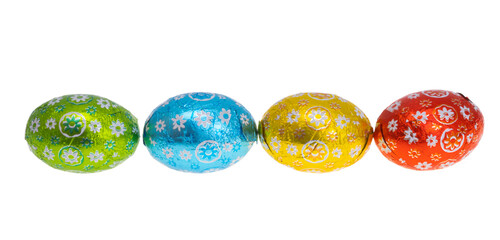 Fototapeta premium chocolate eggs in foil isolated