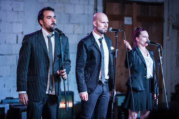 Theater actor artists on stage perform play for audience