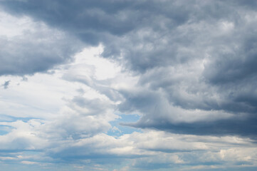 Naklejka na ściany i meble Cloudy sky with various shades of blue color