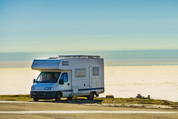 Rv camper in mountains above clouds