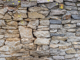 Backgrounds of the old fortress wall. Background of vintage stone wall