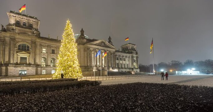 4k winter time lapse of the german parliament building. Snow falling in government district in central Berlin.