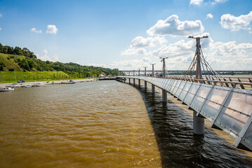 Plock, Poland, Europe - August 12, 2021. Pier over river Vistula ending by Molo Cafe refreshment