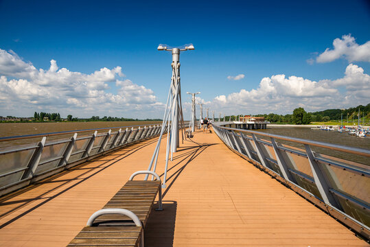 Plock, Poland, Europe - August 12, 2021. Pier over river Vistula ending by Molo Cafe refreshment
