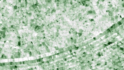 Water waves and ripples coming from above over green mineral crystal background | Background for beauty and skin care product