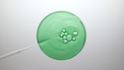 Top view shot of different sized air bubbles comes out from a lab dropper and float on the surface...