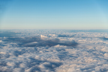 Looking at the cloudscape through airplane window