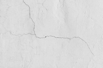 Old cracked surface white crack concrete broken wall cement damaged background