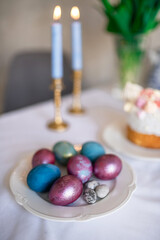 Festive breakfast with easter eggs on white background