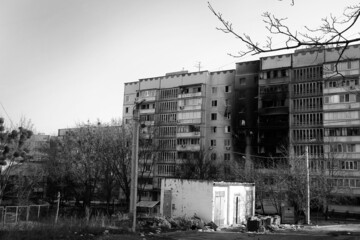 Terrible, bloody war of Russia against Ukraine. Destroyed houses of people in Kharkov after the shelling. February, March, April 2022 Ukraine. Black and white photo of the war.