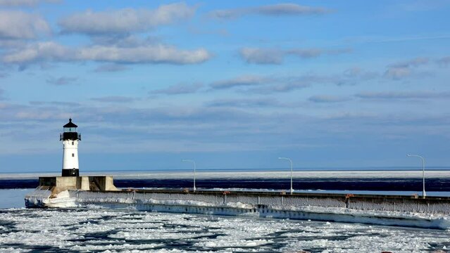north shore winter in duluth pier ligthouse on coast of superior lake minnesota