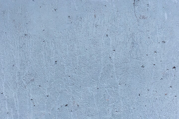 Old concrete wall worn cement background surface with abstract paint blue rough texture