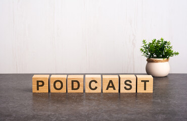 word PODCAST made with wood building blocks