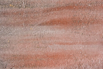 Old reddish brown dirty rough weathered texture concrete wall surface cement worn background