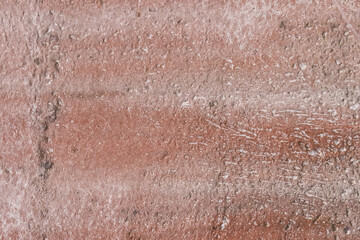 Old reddish brown dirty rough weathered texture concrete wall surface cement worn background
