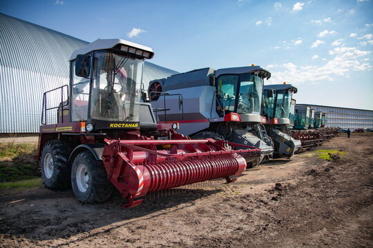 North Kazakhstan Province, Kazakhstan - May 12, 2012: New harvester machines on farm. Blue sky