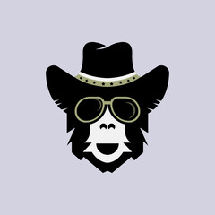 vector of ape head in glasses and hat