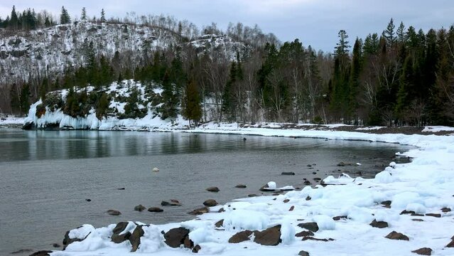 frozen coast of superior lake Minnesota USA winter north shore on cloudy day