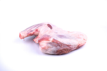 butcher shop - raw lamb shank isolated on white background angle view