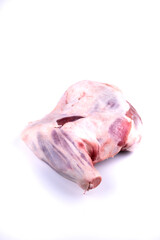 butchery - raw lamb shank isolated on white background angle view