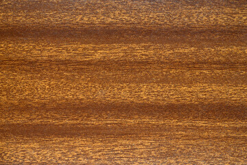 Photo of vintage-style mahogany texture. Wooden background in Victorian style. A tree on a yacht.