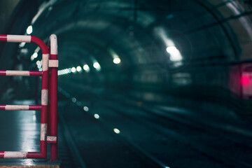 Subway tunnel with blurred lights and a horror atmosphere on it