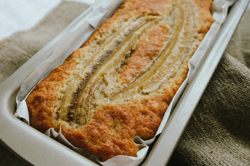 Sweet loaf of banana bread. Trendy homemade pastry.