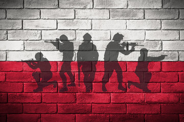 Flaga polski namalowana na ceglanym murze. The Polish flag painted on a brick wall. - obrazy, fototapety, plakaty