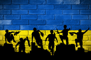 Flaga Ukrainy namalowana na ceglanym murze. The flag of Ukraine painted on a brick wall. - obrazy, fototapety, plakaty