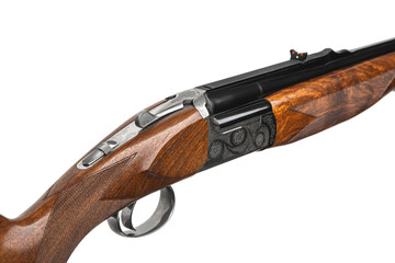 Luxury double-barreled shotgun with a vertical arrangement of barrels. Expensive weapon for hunters. Isolate on a white back.