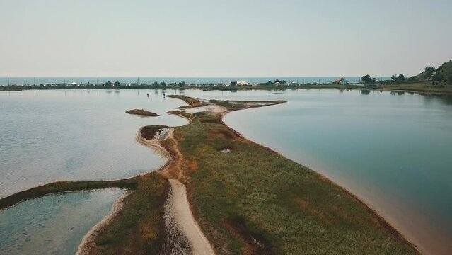 Budak Spit, Zatoka in Ukraine. Near cottages, estuary, swamp and the Black Sea