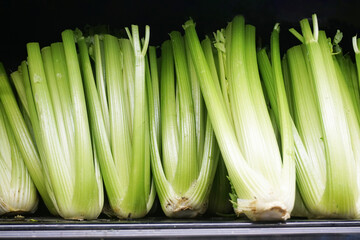 fresh celery on sale in grocery store