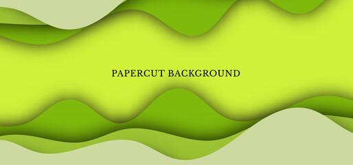 Abstract colorful papercut pattern on green background.